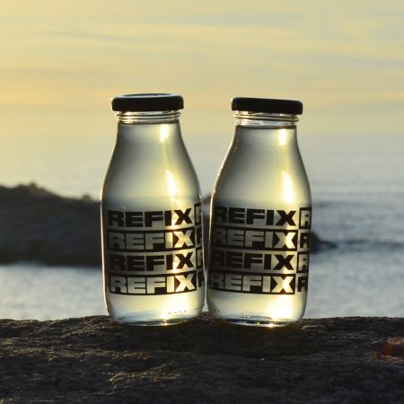 Bebida de recuperación ecológica con agua de mar (Limón o Naranja)